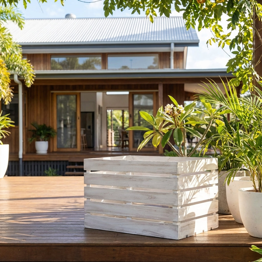 The White Wash Timber Crate - 700mm x 400mm adds rustic charm to your deck or patio. Ideal as a planter, it's perfect for enhancing any outdoor space with style and character.