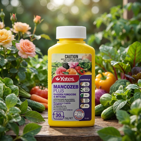 A 750ml bottle of Yates Fungus Gun Systemic Disease Spray rests on a wooden surface among garden vegetables and flowers.
